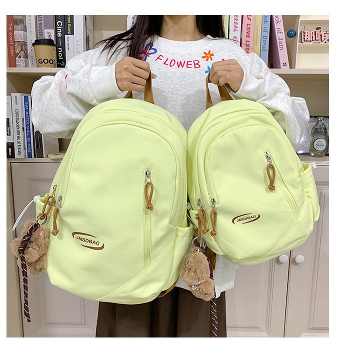 A new high-appearance-level Japanese-style ins backpack for junior and senior high school students, featuring a casual, simple, lightweight and large-capacity backpack for commuting full figure