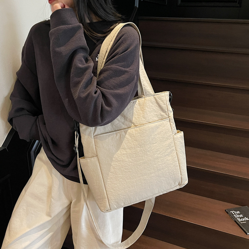 A new Japanese-style ins multi-pocket tote bag, a women's artistic sail bag, and a single-shoulder crossbody bag for students' classes details Picture
