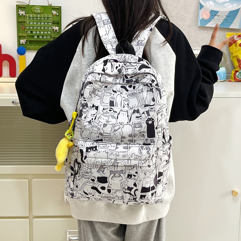 A new high-appeartion-level Japanese-style, niche, individualistic, graffiti comic, cool backpack for both men and women, lightweight and large-capacity backpacks details Picture