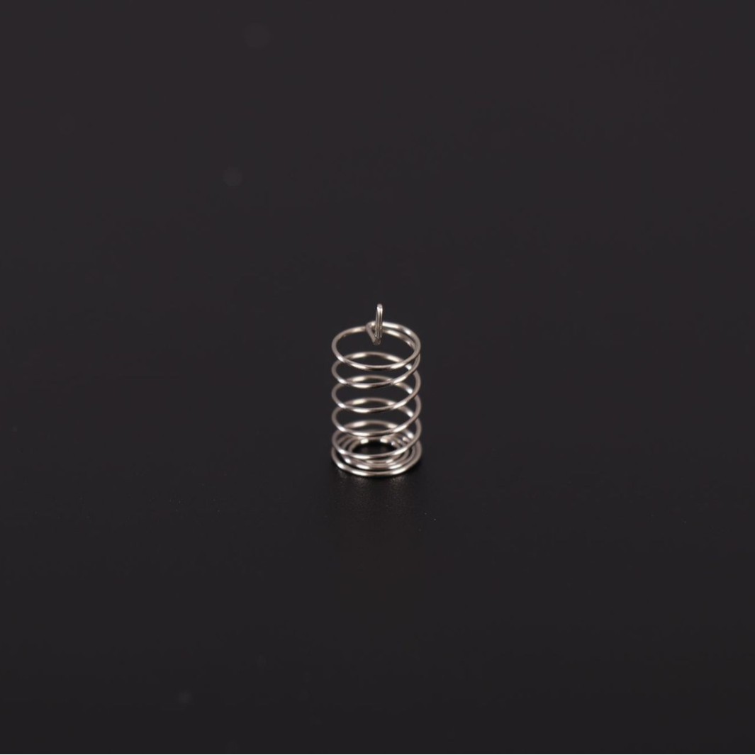 Customized stainless steel small spring battery pressure spring, touch spring, precision compression induction switch spring, key spring Application Scenario
