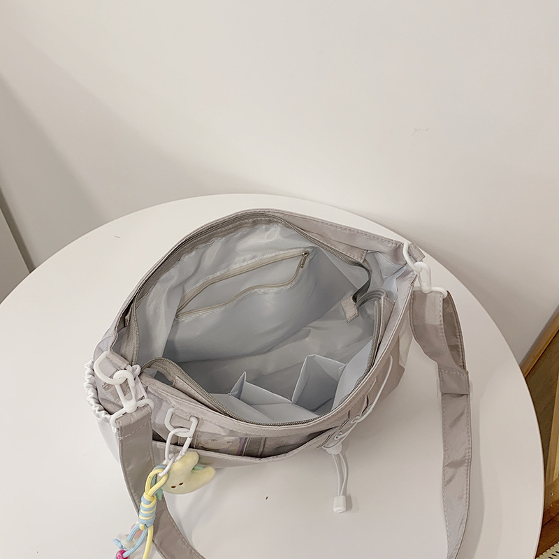 College-style versatile, simple and large-capacity postman schoolbag, women's clothing book, transparent shoulder bag, casual pain bag Specification drawing