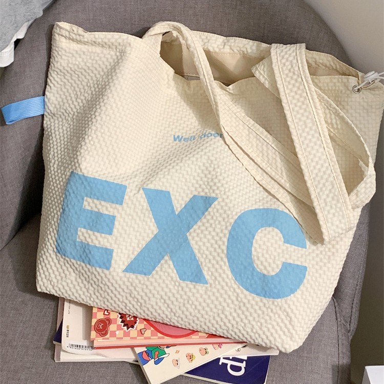Korean-style artistic and simple drawstring solid color letter-shaped tote bag for women's casual, simple and lightweight commuting with large capacity crossbody Specification drawing