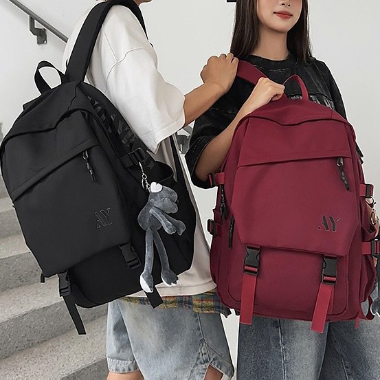 A new high-appeal, niche design backpack from Korean Instagram. It's a simple, lightweight, and large-capacity backpack in a solid color for couples full figure