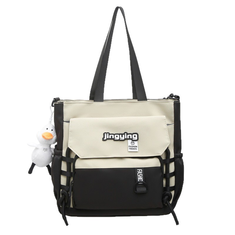 New minimalist color-blocking couple crossbody bag, high appearance level, casual large-capacity two-piece backpack for primary and secondary school students Item Picture