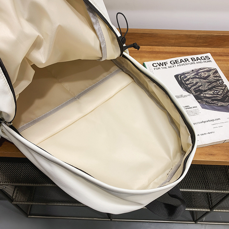 Trendy backpacks, commuter computer bags, Japanese-style simple schoolbags for junior and senior high school students, large-capacity new couple backpacks Application Scenario