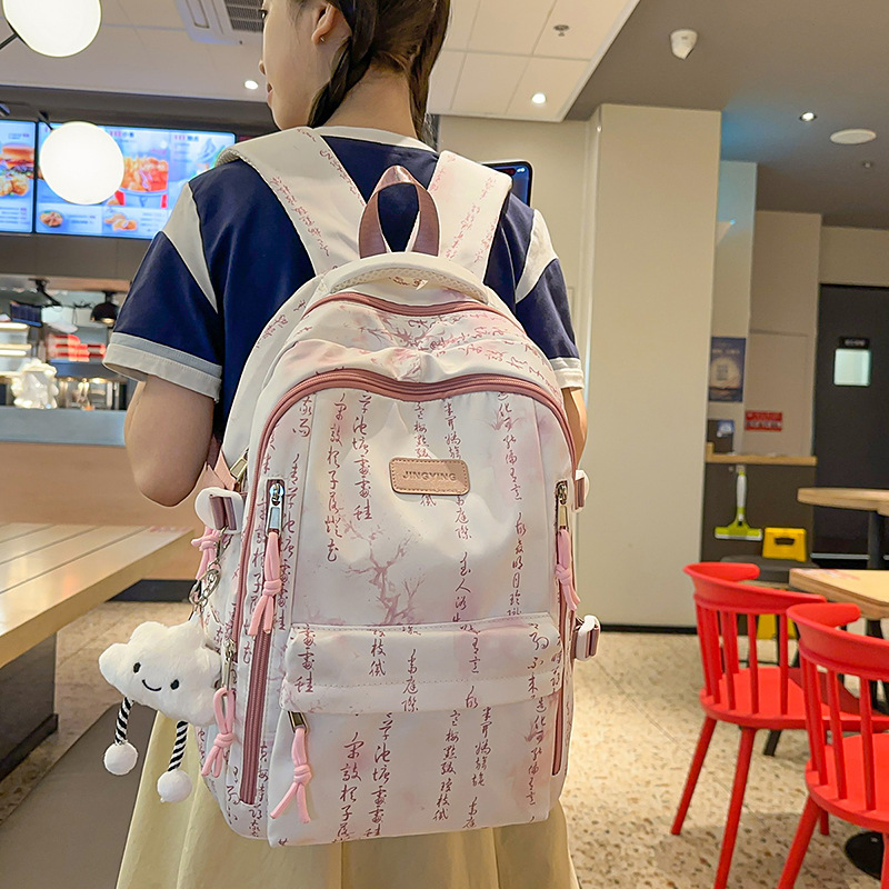 Korean-style fashionable backpack, high appearance level, niche, simple and versatile, large-capacity schoolbag, backpack for middle and high school students on the shoulder full figure