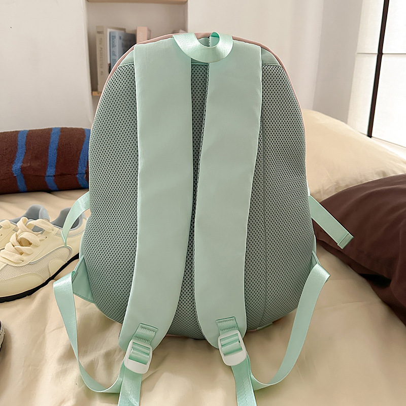 A new Korean-style Instagram backpack with a high level of appearance, fresh and sweet candy color, and a color-blocking double-shoulder bag for junior and senior high school students Specification drawing