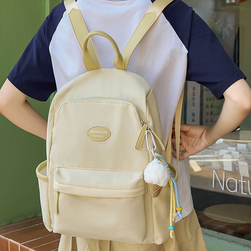 A new Japanese-style ins fresh and sweet candy-colored backpack, a simple and large-capacity backpack in solid colors for junior and senior high school students details Picture