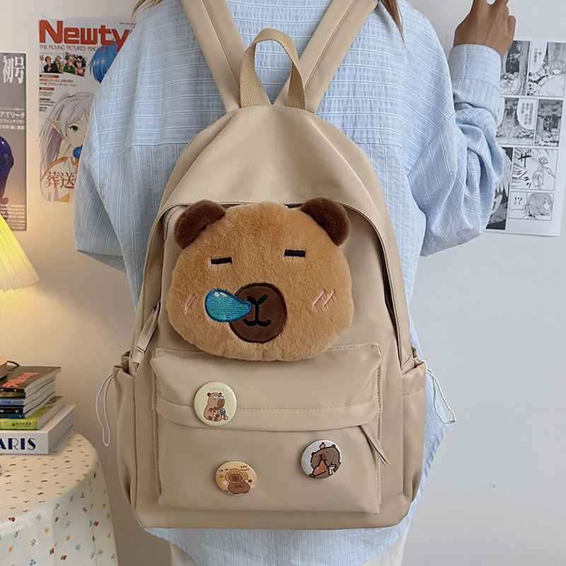 A new high-appeal, fresh and cute cartoon bear backpack for primary and secondary school students, a casual, lightweight and large-capacity backpack full figure