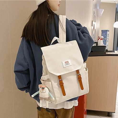 A new minimalist backpack with a Korean niche design, a versatile travel backpack, and a lightweight, color-blocking, large-capacity student schoolbag full figure
