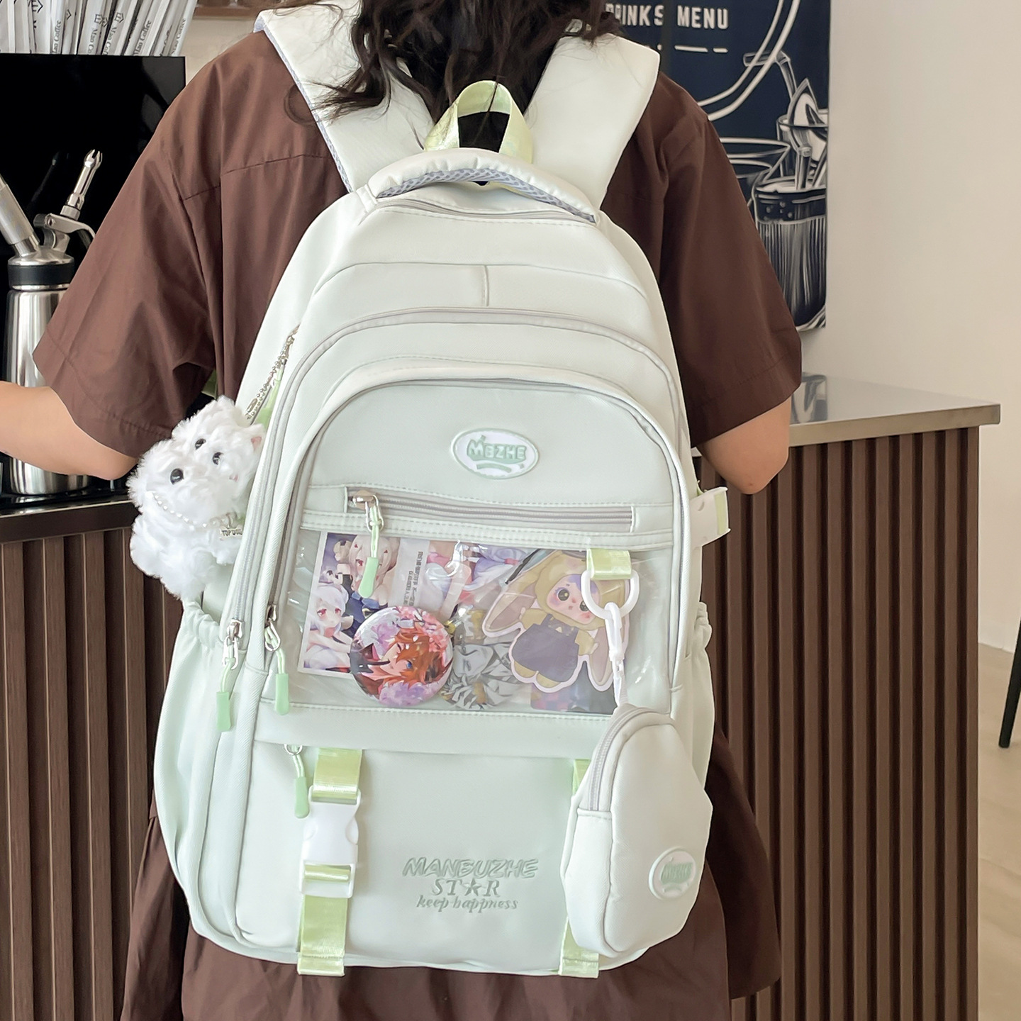 A new Japanese style backpack with a high level of appearance, fresh and sweet, candy-colored, casual, simple, lightweight and versatile, large-capacity backpack full figure