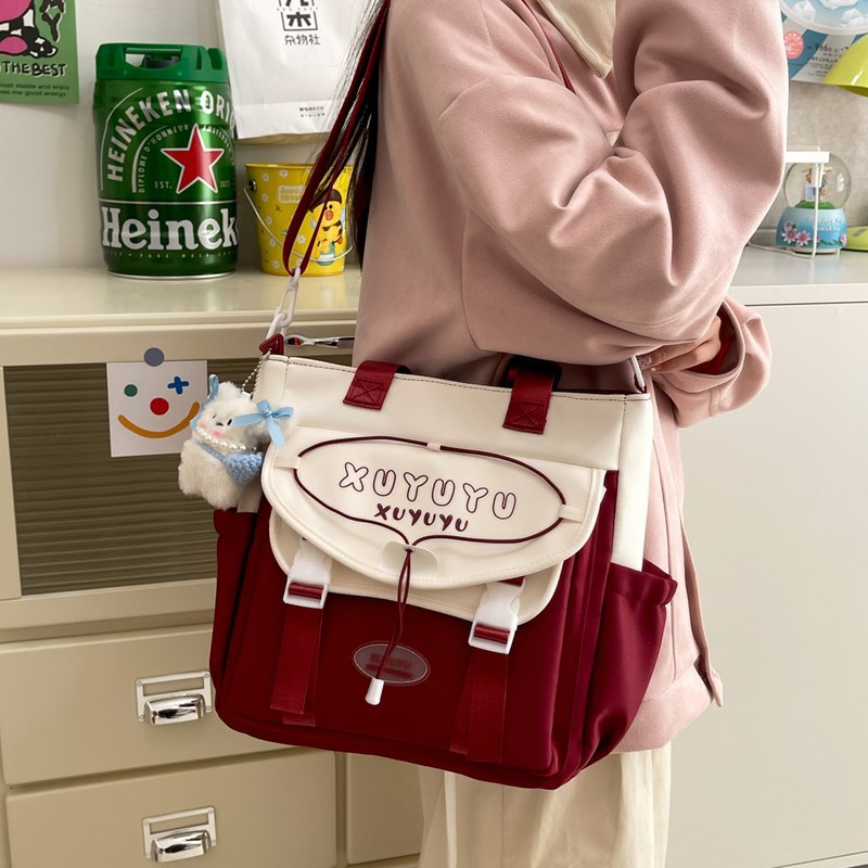 A high-appeartion-level Japanese school-style crossbody bag, a casual bag for female students' classes, a large-capacity hand-held tutorial bag, and a commuting bag details Picture