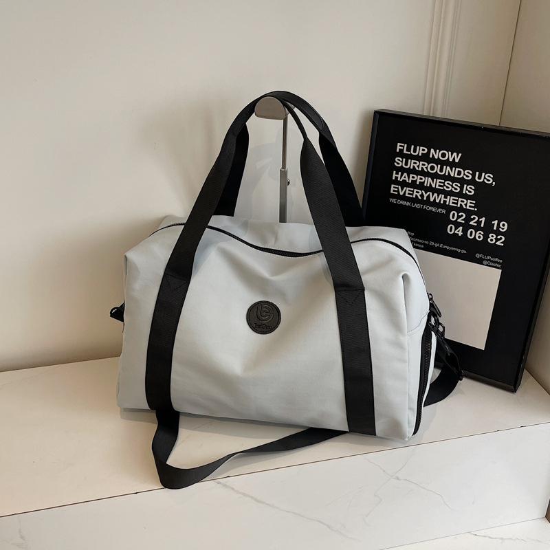 Travel bag, women's short-distance large-capacity luggage bag, fitness bag, men's fashionable handbag, casual commuting, crossbody storage Application Scenario