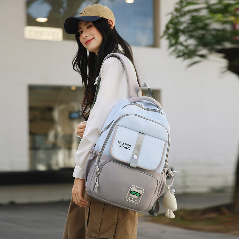 A new high-appearance-level Korean ins fresh and sweet color-blocking backpack, a lightweight and large-capacity backpack for junior and senior high school students details Picture
