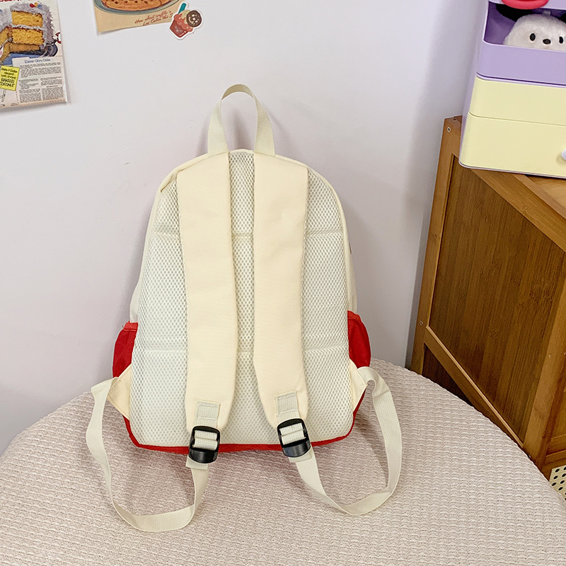 A new Japanese style backpack with a high level of appearance, sweet, fresh and cute printed words. It is a large-capacity casual backpack for junior and senior high school students Specification drawing
