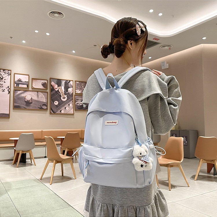 The new summer ins cream-themed college student schoolbag features a high aesthetic level, a single-shoulder bag with a niche design sense and a simple backpack full figure
