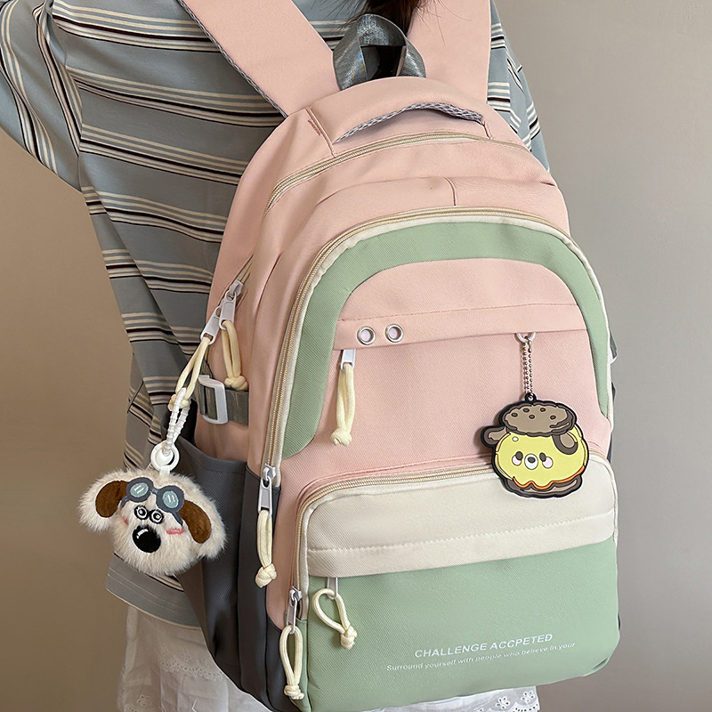 A new Korean-style Instagram backpack with a high level of appearance, fresh and sweet color contrast and splicing, and a large-capacity backpack for junior and senior high school students details Picture