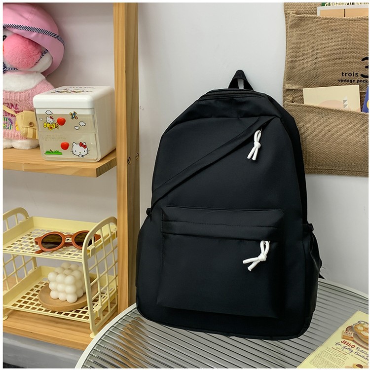The new forest-themed solid color is simple and versatile. It is a large-capacity, lightweight backpack for junior high school, senior high school and college students full figure
