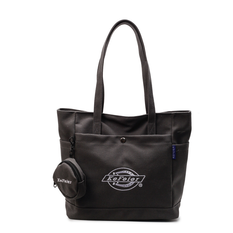 The 2025 new casual large-capacity tote bag is a simple and versatile single-shoulder bag for commuting and for college students attending classes Item Picture