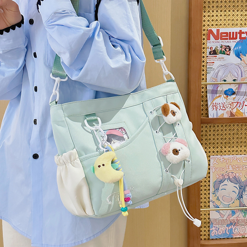 College-style versatile, simple and large-capacity postman's class bag, casual and lightweight single-shoulder bag, fresh and sweet crossbody bag details Picture