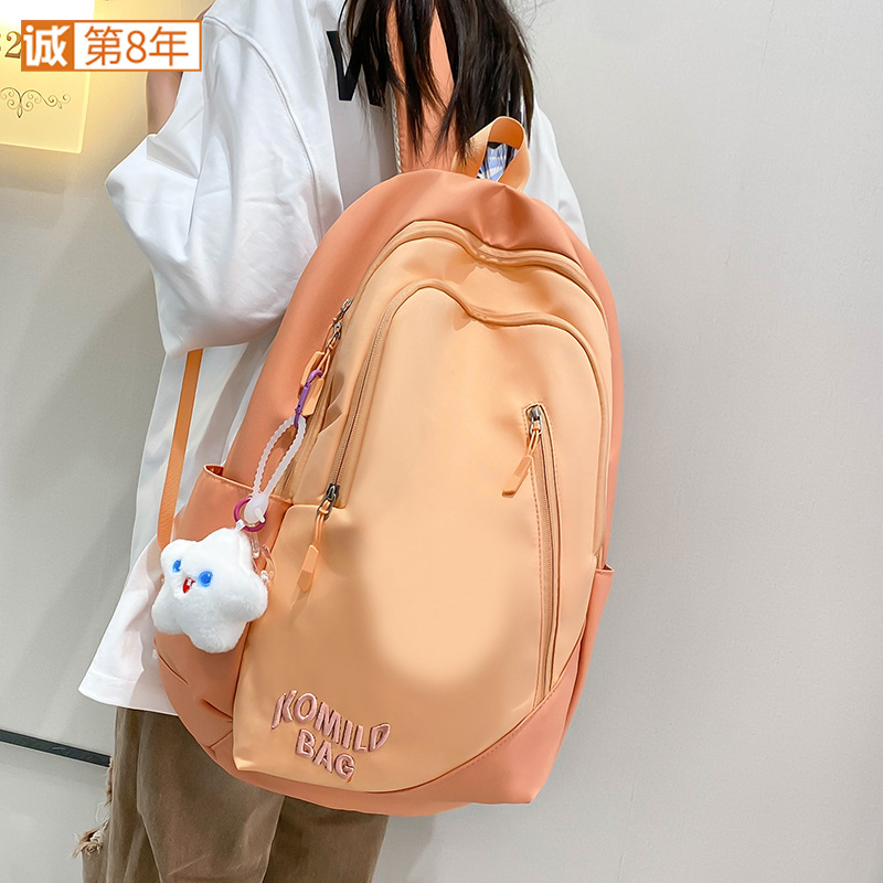 Schoolbag for female high school students, American retro large-capacity backpack, trendy letter-embroidered college student couple backpack full figure