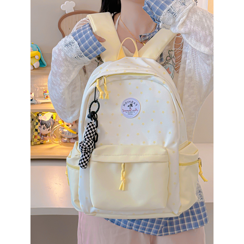 A new, fresh and sweet, color-blocking and star-shaped backpack from ins, a lightweight backpack for junior and senior high school students full figure