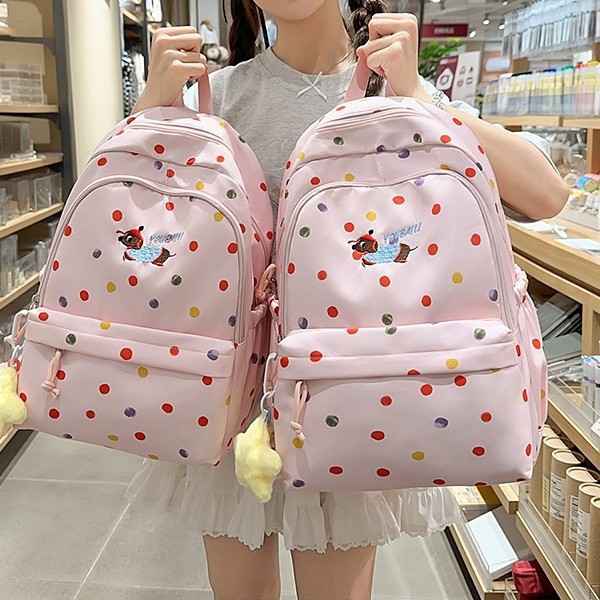 A new high-appeal, fresh, sweet and cute dot-shaped polka dot backpack from Japanese Instagram, a lightweight backpack for junior and senior high school students full figure