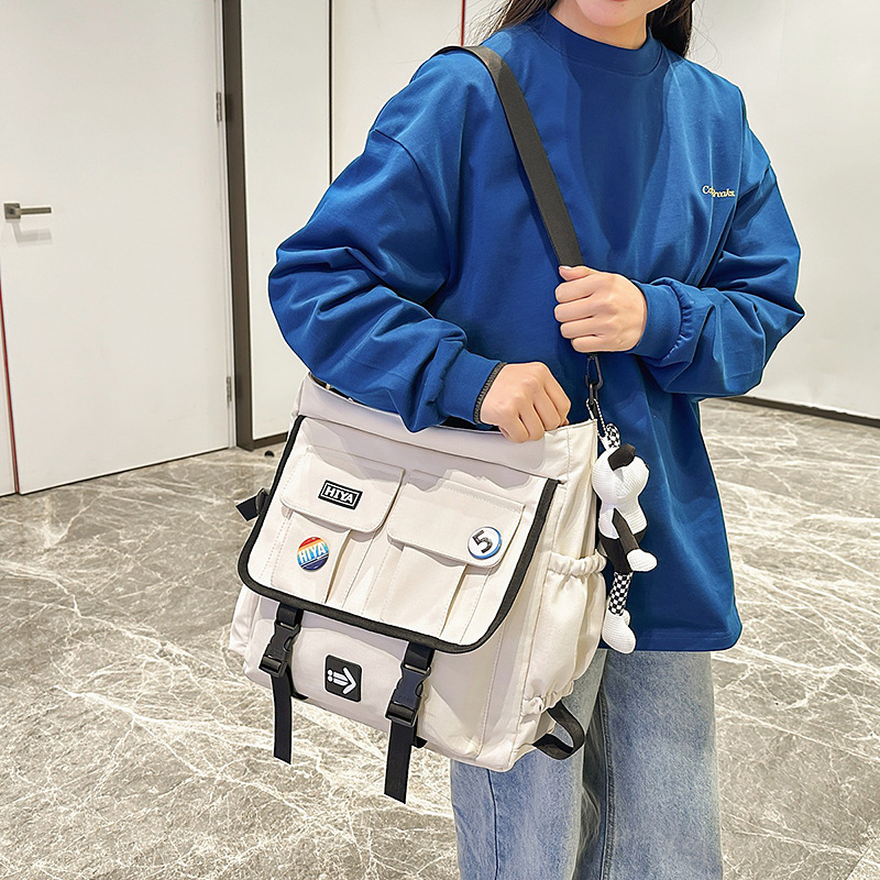 Japanese multi-compartment single-shoulder bag, large-capacity crossbody bag, 2025 new style simple and casual backpack, fashionable after-school bag details Picture