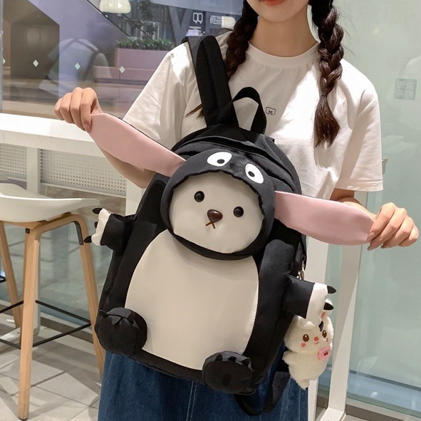Cute cartoon backpack for girls, Korean version of long-eared bear, junior high school student doll backpack, and schoolbag for grades three to six of primary school students full figure