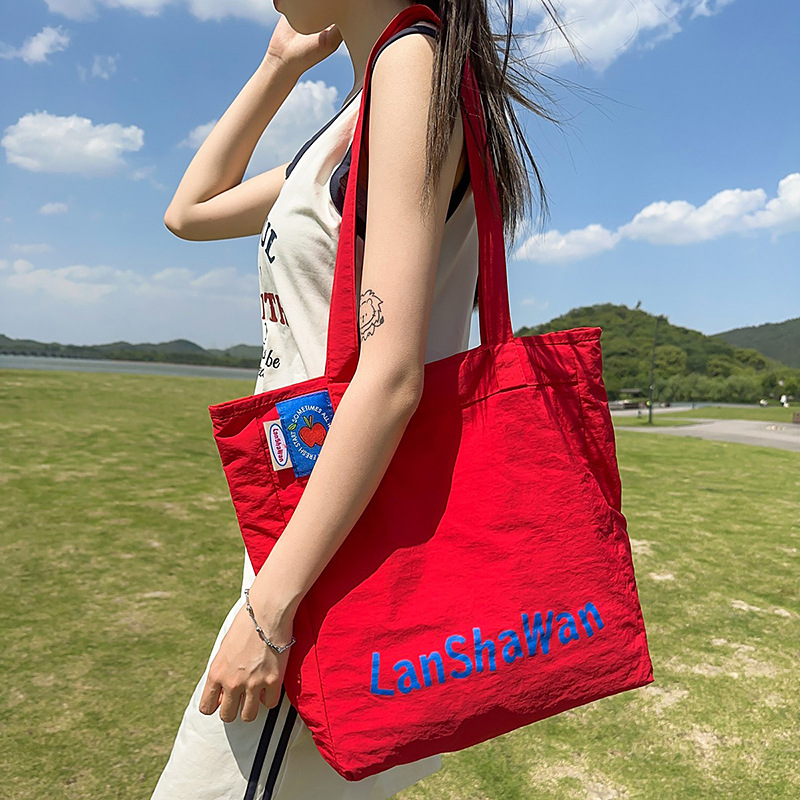Korean InS-style laid-back red tote bag, large-capacity single-shoulder bag, seaside vacation, high appearance level, girlish heart crossbody bag details Picture
