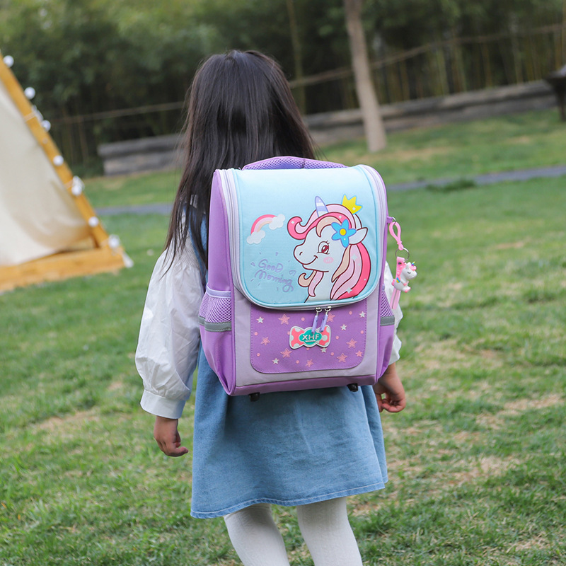 A cute and lightweight cartoon unicorn backpack for primary school and kindergarten students, a rainbow space children's small backpack on both shoulders details Picture