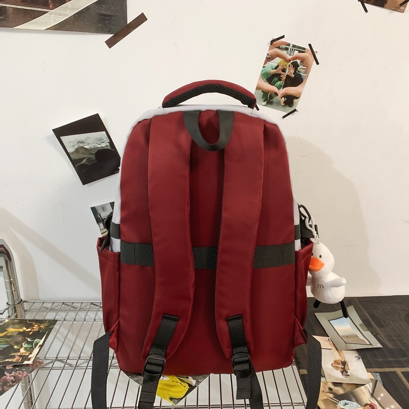 High school student schoolbag, large capacity, high appearance level, contrasting color, high school student backpack, trendy college student couple backpack Specification drawing