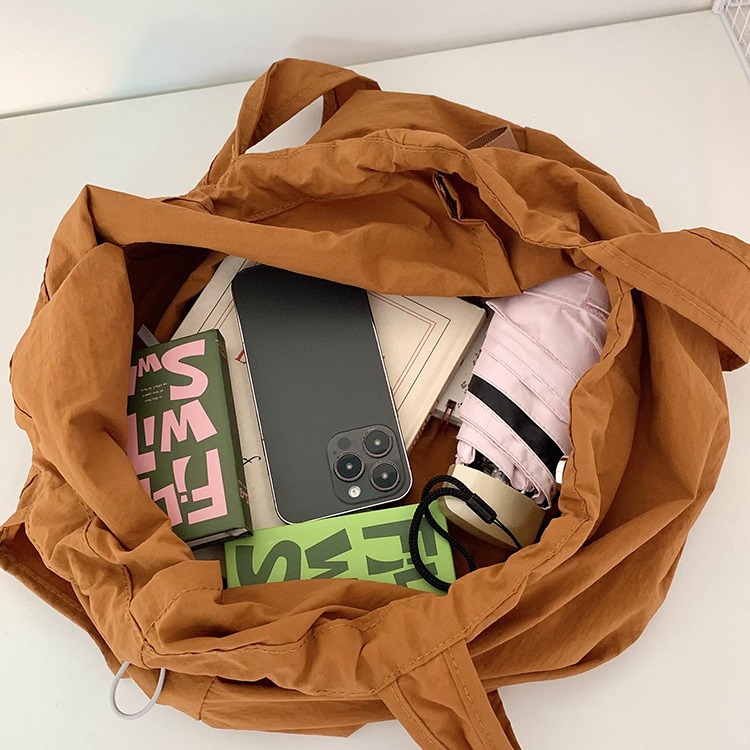 2024 New cute dog embroidered single-shoulder bag, large capacity, laid-back style tote bag, student commuting bag for classes Application Scenario