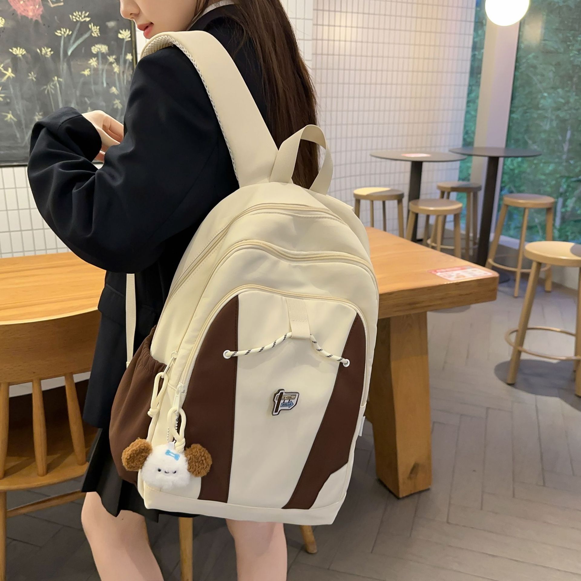 A simple and cute backpack for female college students with high appearance standards, a fashionable large-capacity trendy backpack, and a sports travel computer bag details Picture