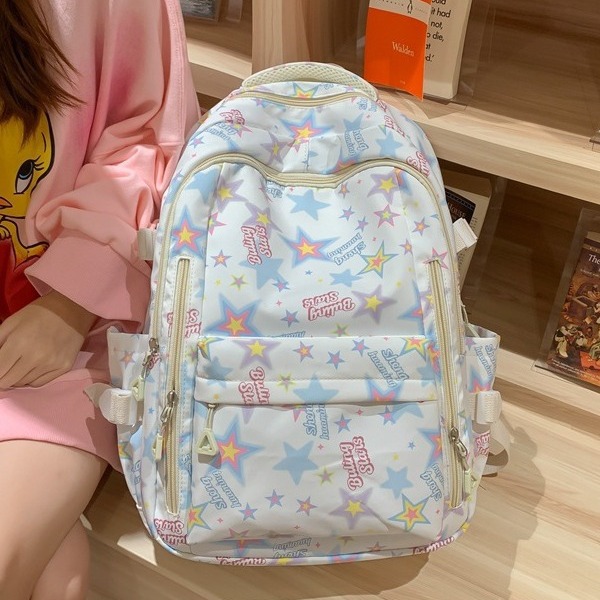 A Japanese-style inS-style schoolbag for a female junior high school student with a high level of appearance, a star-shaped backpack, and a cute graffiti backpack for primary school students full figure