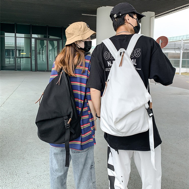 Men's washed canvas backpack, Japanese and Korean niche backpack, solid color, retro, high-end, high couple style folding backpack details Picture