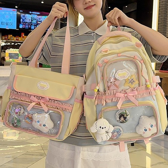A new high-appearance-level Japanese ins fresh and sweet dopamine smug pain bag, a large-capacity backpack for middle and high school students full figure