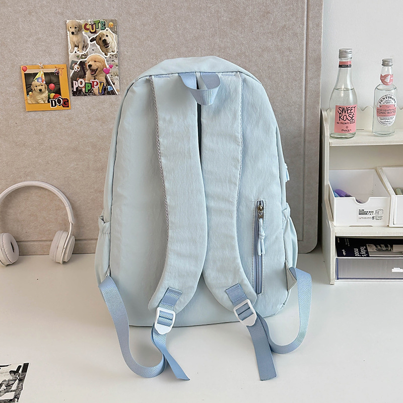 2025 New schoolbag for junior high school girls, high appearance level, simple solid color backpack for college students, women's casual travel backpack Specification drawing