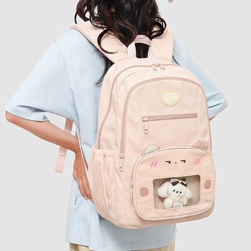 The new forest-themed ins high-appearance-level fresh and sweet candy-colored backpack is a lightweight and large-capacity backpack for junior and senior high school students full figure