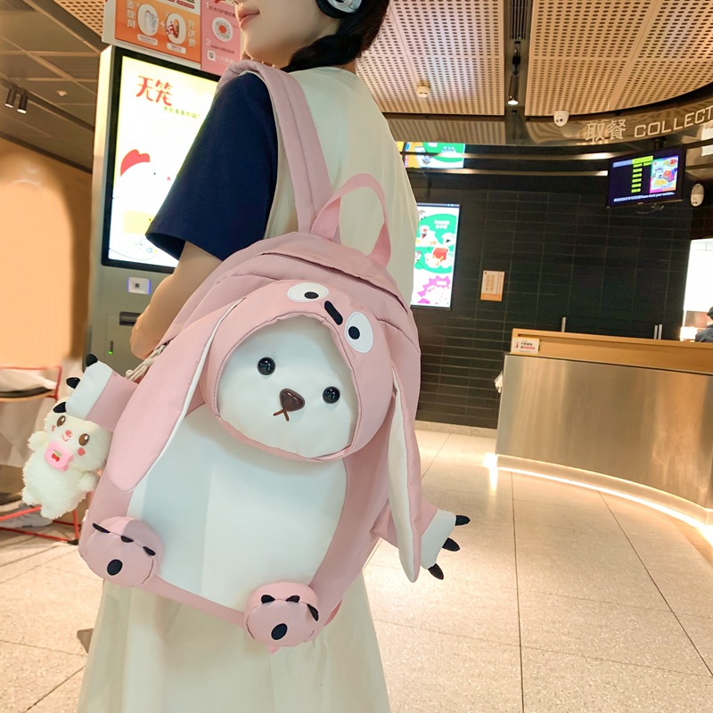 Cute cartoon backpack for girls, Korean version of long-eared bear, junior high school student doll backpack, and schoolbag for grades three to six of primary school students details Picture