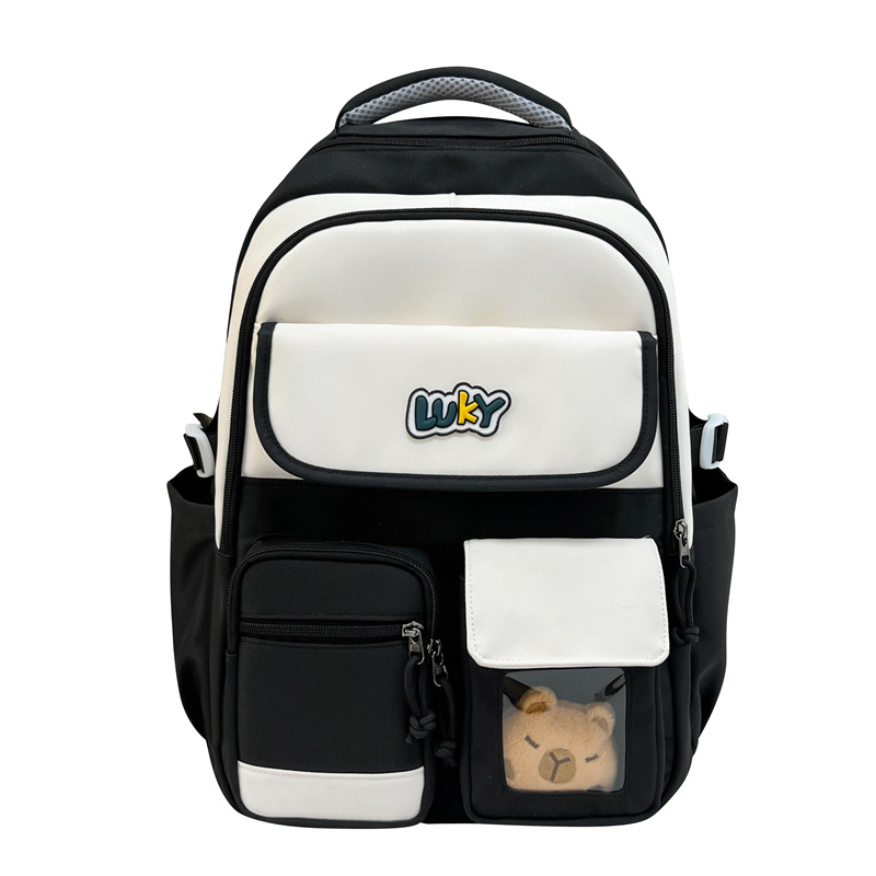 A new high-appeal, fresh and sweet school-style color-blocking backpack for junior and senior high school students, a lightweight travel backpack Item Picture