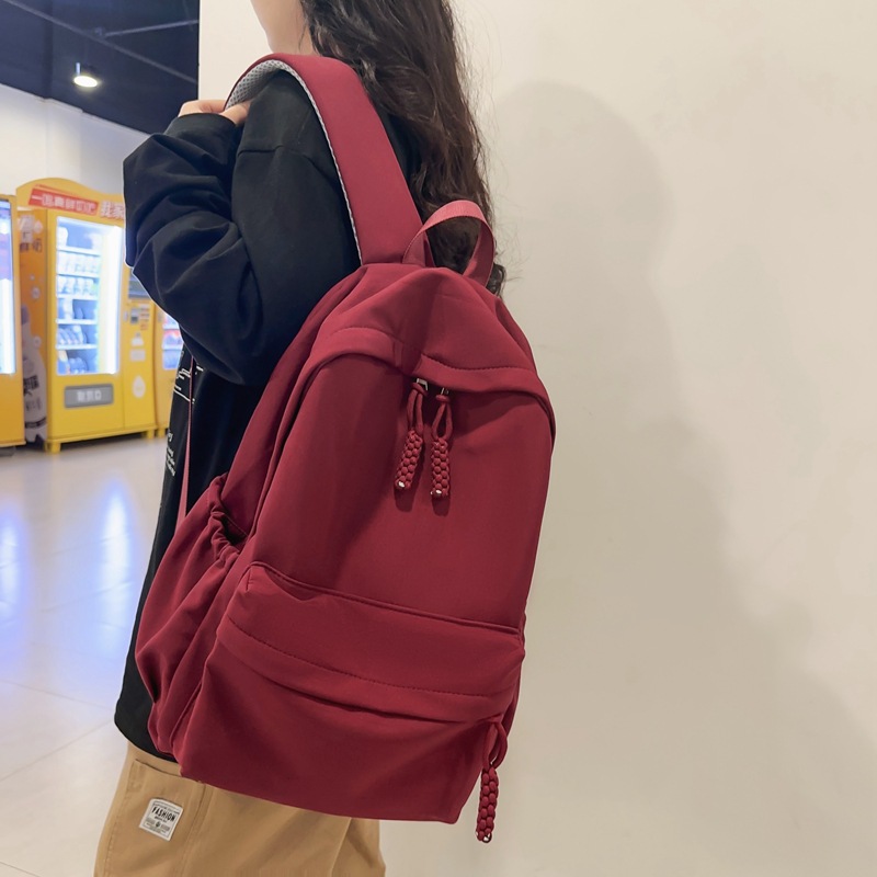 Schoolbag for female students, in an Instagram style, simple Korean style, casual backpack for junior high school students, large-capacity, lightweight backpack for senior high school students full figure