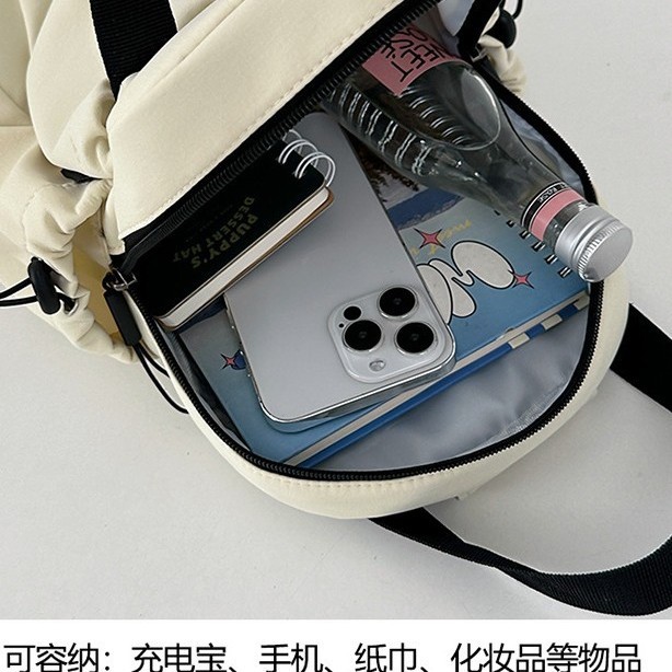 Summer new simple solid color mountain-style functional small shoulder bag, versatile for outdoor travel and sports, lightweight small backpack for men Application Scenario