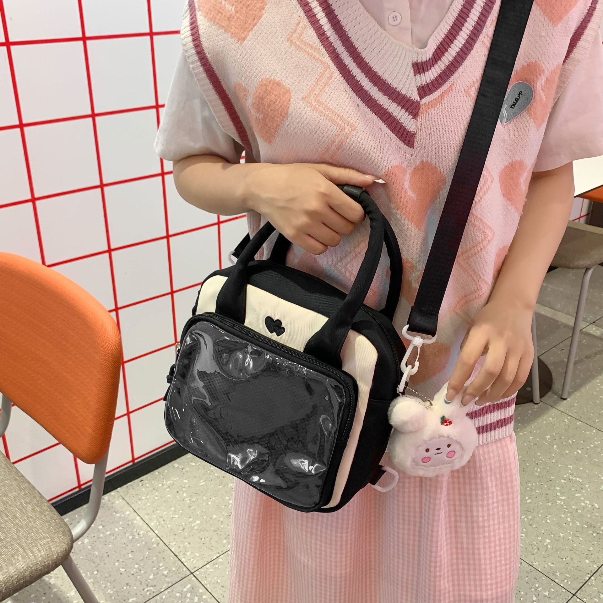 2024 New Japanese-style cute sporty transparent crossbody bag, women's fashion versatile, high appearance level backpack, hand-held pain bag details Picture