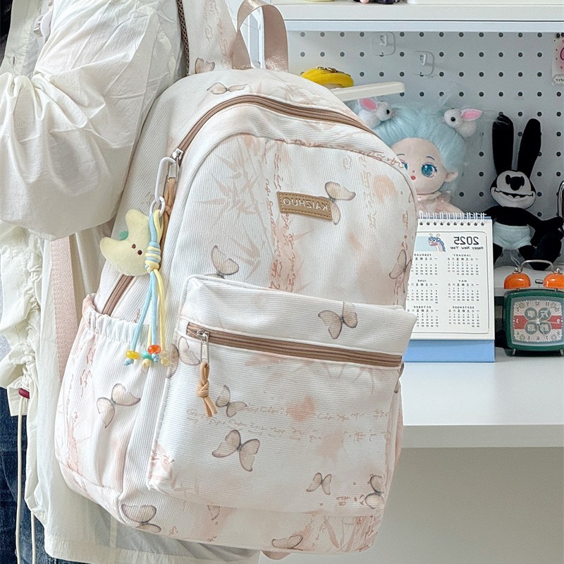 A new high-appearance-level Chinese-style backpack with fresh and sweet butterfly prints, a casual and lightweight backpack for junior and senior high school students full figure