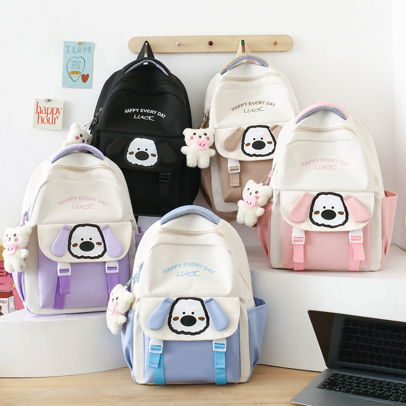 Cute and stress-relieving new schoolbag for primary school students, cartoon dog, casual junior high school student four-piece set, girls' backpack Application Scenario