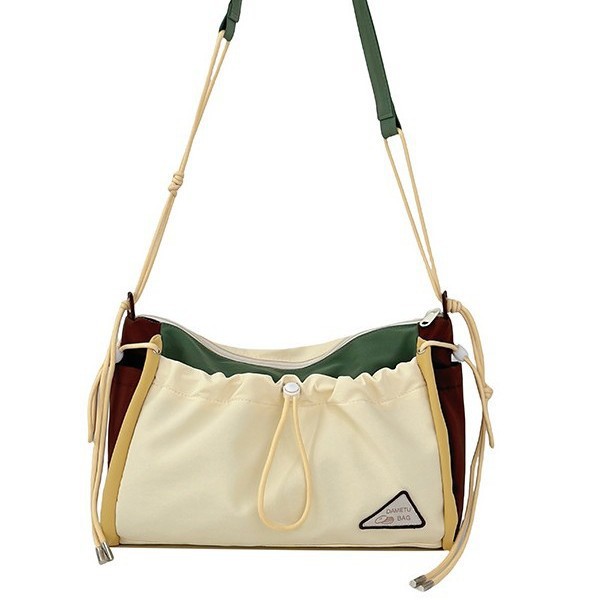 2025 New large-capacity color-blocking crossbody bag for women, lightweight single-shoulder bag with high appearance level, Korean-style commuting and travel dumpling bag Item Picture