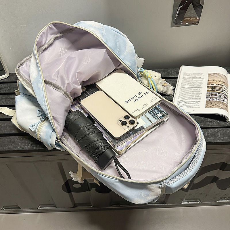 A new Japanese-style ins high-appearance-level tie-dye color-blocking backpack with a fresh and sweet taste, and a large-capacity backpack for junior and senior high school students Application Scenario