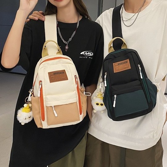 A new high-appearance-level workwear style color-blocking and patchwork chest bag for couples, a lightweight travel and mountaineering crossbody bag details Picture