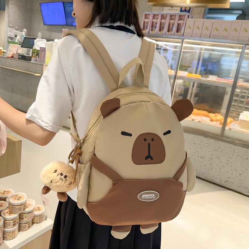 A cute little girl's small backpack for going out, a small and lightweight backpack for women's shoulders, a new summer 2024 cute baby tutorial class small schoolbag full figure